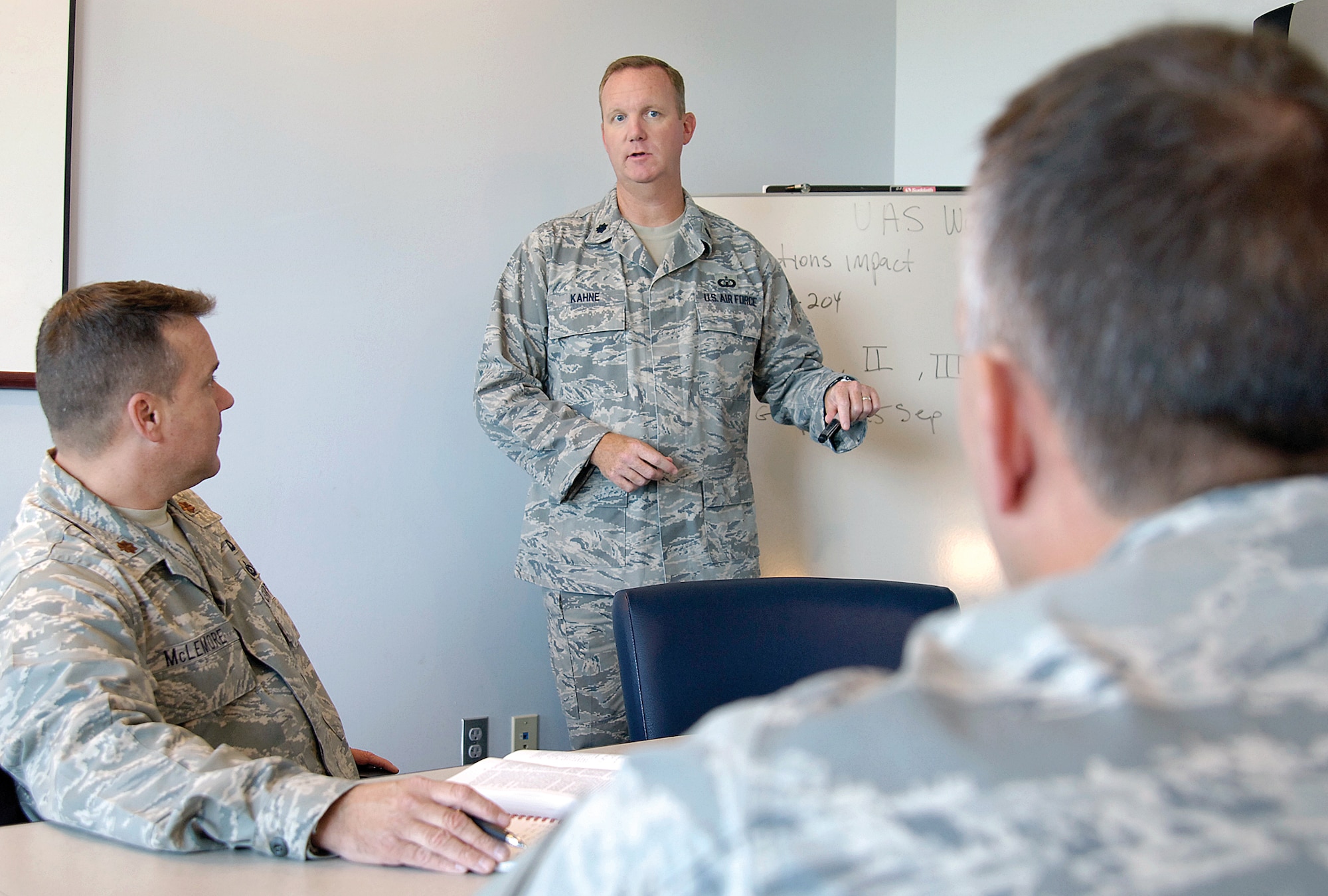 Lt. Col. Richard Kahne leads a meeting of the Unmanned Aircraft Systems Working Group Aug. 31, 2009, at the Air Force Flight Standards Agency in Oklahoma City as they discuss issues integrating unmanned aircraft into the national airspace. (U.S. Air Force photo/Margo Wright)