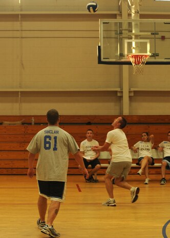 Steve Wisecarver attempts to save the ball during an intramural volleyball match at the Fitness and Sports Center here Sept. 8. The fitness center has 66 games scheduled during the volleyball season. Wisecarver is with the 437th Communications Squadron. (U.S. Air Force photo/Senior Airman Katie Gieratz)