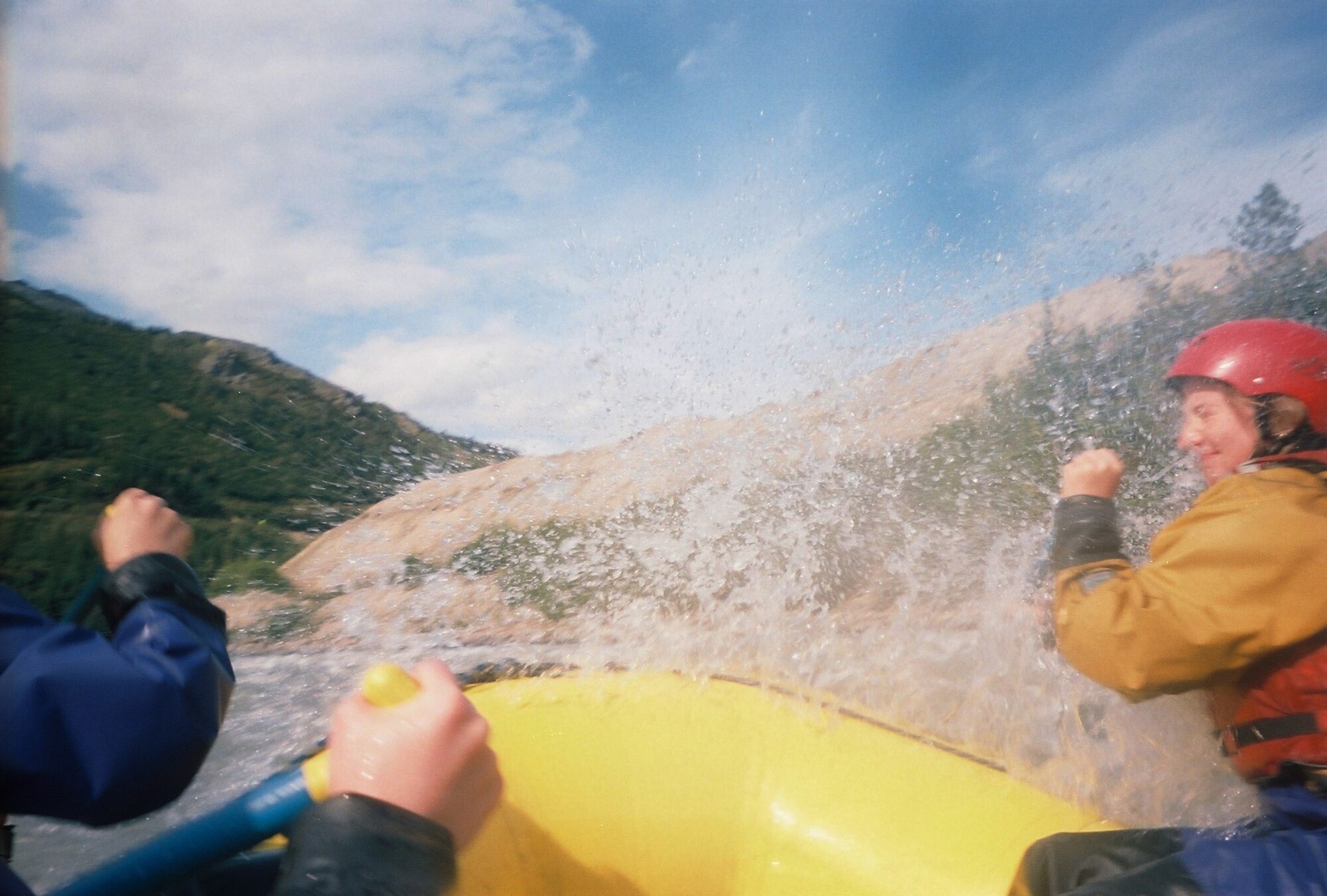 Senior Airman Rachael Pritchard gets spashed while paddling through white water rapids during an annual Refuge rafting trip Aug. 22, 2009 at Denali National Park and Preserve, Alaska.  Refuge is a faith based group sponsored by the Eielson Air Force Base Protestant chaplain staff and provides low cost trips to junior Airmen. Airman Pritchard is a medical logistics technician assigned to the 354th Medical Group. (U.S. Air Force photo/Airman 1st Class Laura Goodgame)