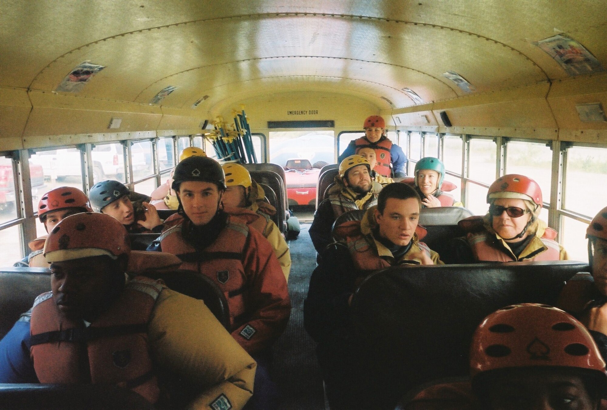 Airmen load onto a bus wearing dry suits during an annual Refuge white water rafting trip Aug. 22, 2009 at Denali National Park and Preserve, Alaska. The suits are mandatory when rafting in Denali due to the low temperature of the water. (U.S. Air Force photo/Airman 1st Class Laura Goodgame)