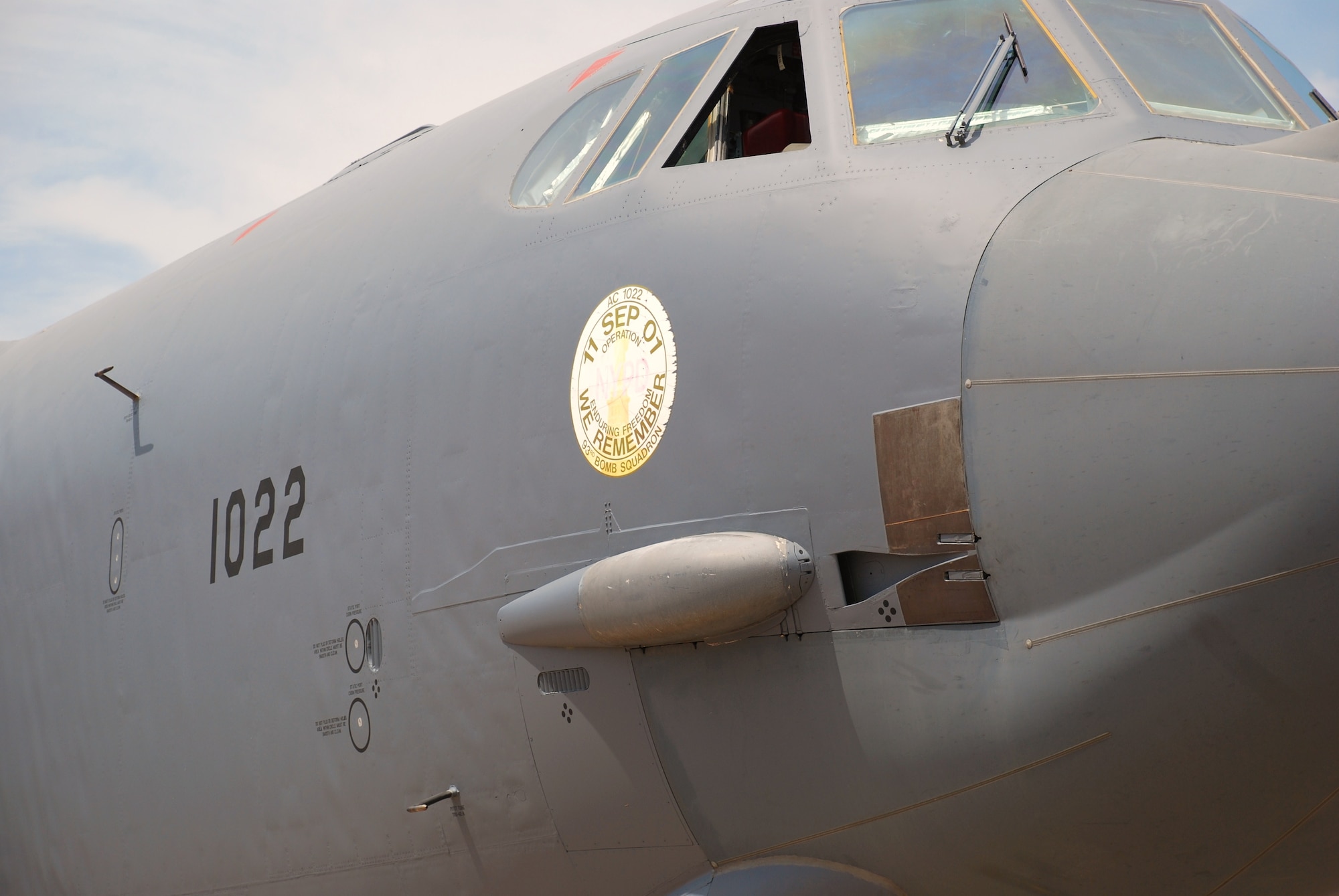 A round piece of nose art remains on a B-52H Stratofortres that was part of the first strike force to respond to the events of Sept. 11, 2001. The art is displayed in memory of the event and those who lost their lives. (U.S. Air Force photo/John Ingle)
