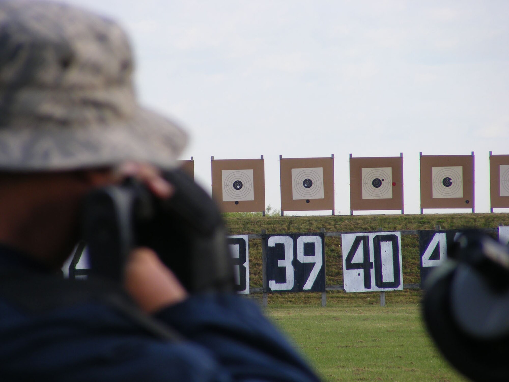 Tech. Sgt. Darryl Smith, from the 355th Equipment Maintenance Squadron, takes aim at a target at the 2009 National Rifle and Pistol Championships at Camp Perry, Ohio. Three members of the team, who are stationed at Davis-Monthan, helped the Air Force take home the gold. (courtesy photo)