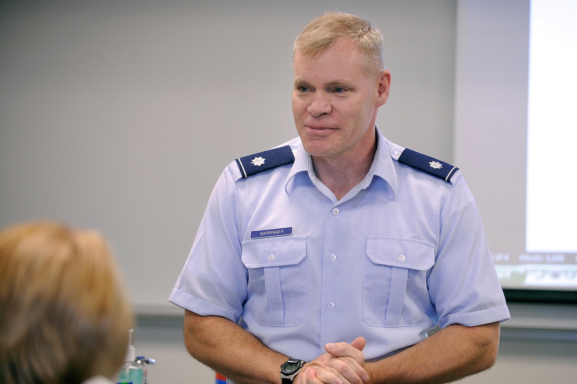 U.S. AIR FORCE ACADEMY, Colo.-- Doctor (Lt. Col.) Leon Barringer, a Reservist Public Health officer with the 446th Aeromedical Staging Squadron, McChord Air Force Base, Wash., and currently a USAFA instructor of biology, works with and guides cadets through a biology lab here Sept. 4. Colonel Barringer has a son, Cadet 3rd. Class Ben Barringer, currently attending the Academy. (U.S. Air Force photo/Michael Kaplan)