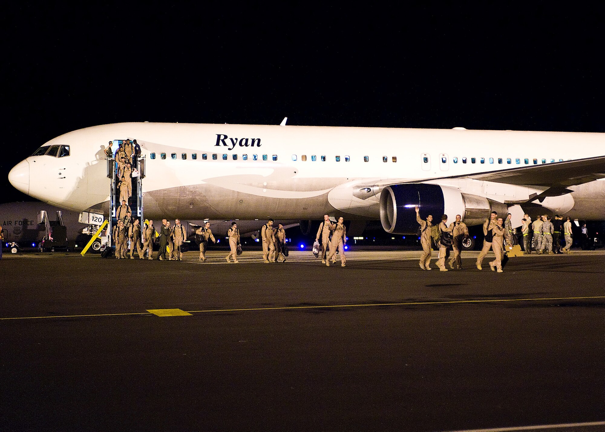 Airmen from the 3rd Airlift Squadron return to Dover Air Force Base Sept. 3, after their four-month deployment to Southwest Asia. The 3rd AS deployed as the 816th Expeditionary  Airlift Squadron to provide combat airlift and airdrop, aeromedical evacuations, humanitarian relief and distinguished visitor movement in the U.S. Central Command area of responsibility. (U.S. Air Force photo/Tom Randle)