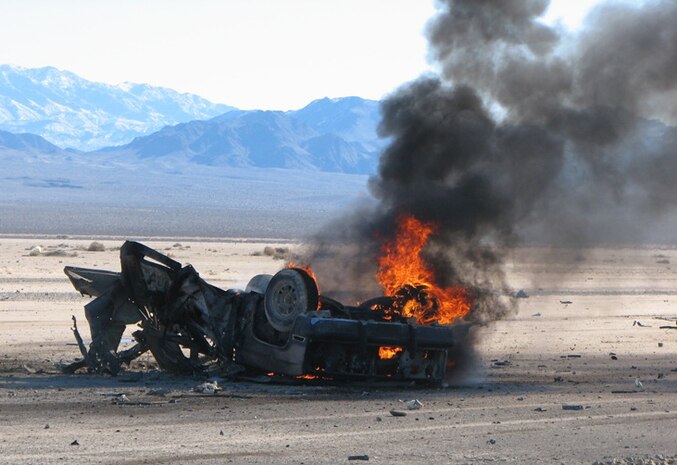 The remains of a High Speed Moving Target sit on the three-mile target track located on the Nevada Test and Training Range.  These targets are provided by the 98th Range wing and provide aircrews the ability to hone skills used in engaging a target moving in excess of  50 mph, training available in only one place in the world, the NTTR. (Courtesy photo)