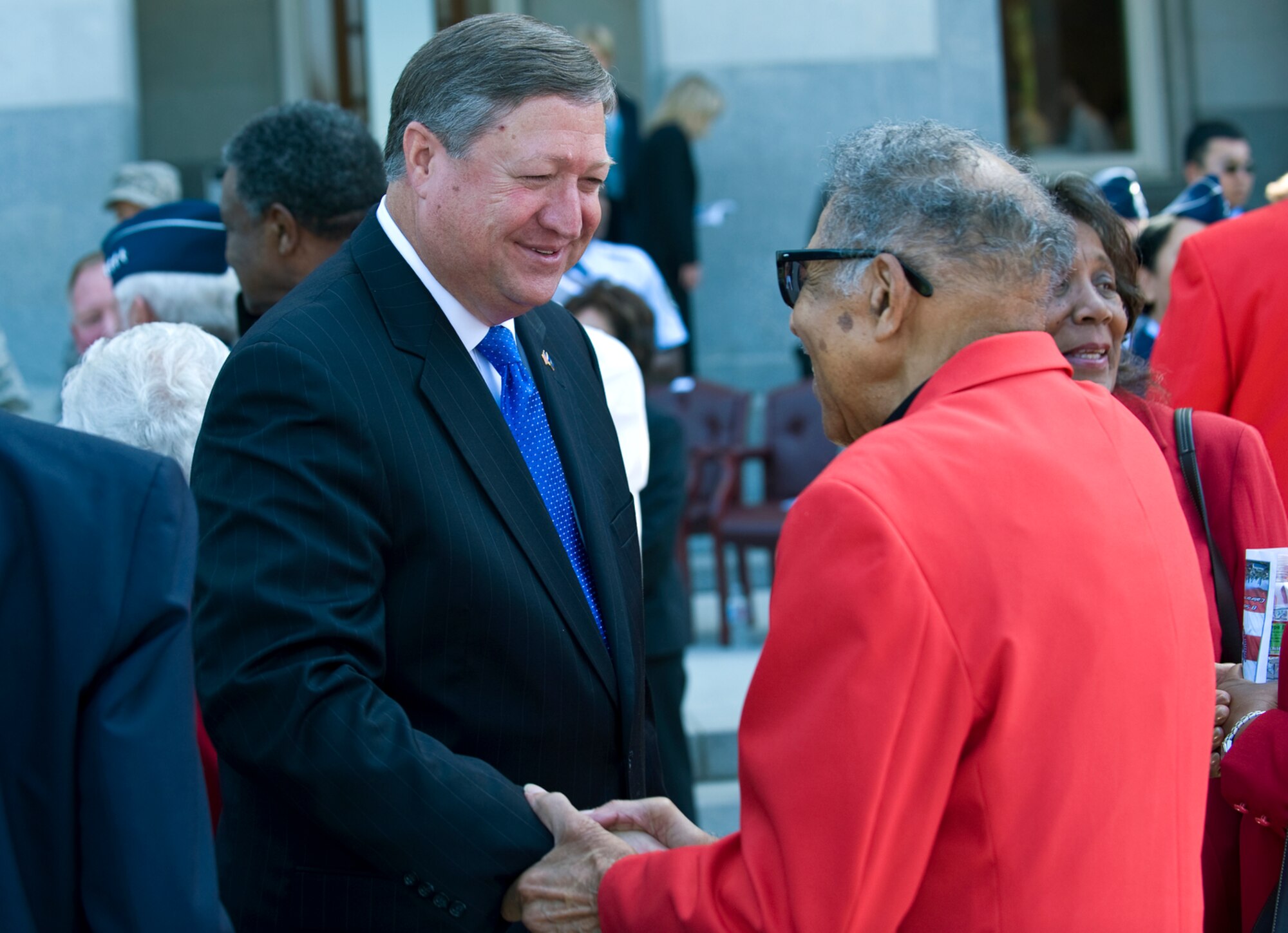 Secretary of the Air Force Michael Donley greets retired Tech. Sgt. Boyd Taylor, a Tuskegee Airman from Sacramento’s Col. George S. “Spanky” Roberts chapter of the Tuskegee Airmen, after a proclamation ceremony Sept. 8 at the California State Capitol building’s West steps. The proclamation named Sept. 8 to 13, 2009 as Air Force Week-Sacramento. The ceremony featured a flyover by a C-17 Globemaster III and a KC-10 Extender, as well as performances by the Air Force Band of the Golden West and the Air Force Drill Team. Air Force Week-Sacramento presents activities and exhibitions used to educate the community about the Air Force's capabilities and missions. Other Tuskegee Airmen in attendance were retired Maj. Larry Brown, Retired 1st Lt. Milford Craig and retired Senior Master Sgt. George Porter. Also in attendance was Ms. Gloria Edith Roberts, widow of the late Col. George S. Roberts, the first black commander of the 99th Pursuit Squadron and the namesake of the Sacramento chapter of the Tuskegee Airmen. (U.S. Air Force photo/Staff Sgt. Bennie J. Davis III)