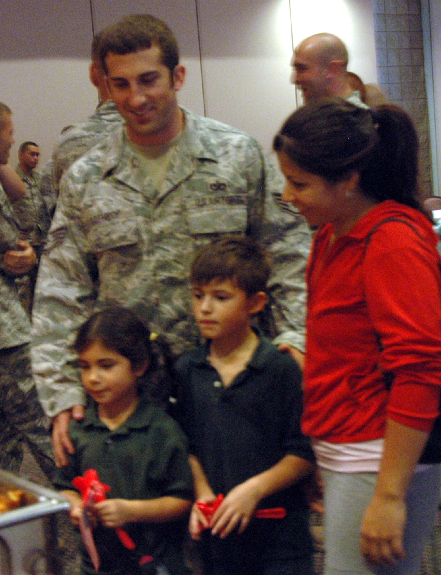 Staff Sgt. Arthur Lothrop, CATM Instructor, 325th Security Forces Squadron and his family attend the Warrior Celebration Sept. 8 from 4 to 5 p.m. at the Heritage Club. (U.S. Air Froce photo by Airman 1st Class Veronica McMahon)