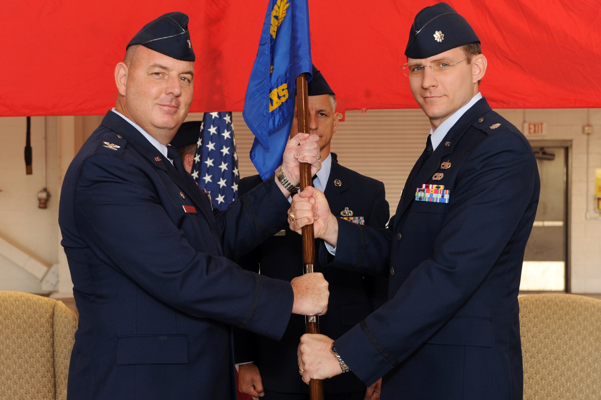 Col. Chris Hair, 19th Maintenance Group commander, appoints command of the 19th Aircraft Maintenance Squadron to Lt. Col. Paul Pethel during the assumption of command ceremony at Little Rock Air Force Base, Ark. Sep. 1.  Lt. Col. Pethel was recently the commander of the 100th Maintenance Squadron, RAF Mildenhall, United Kingdom. (US Air Force photo by Senior Airman Jim Araos)