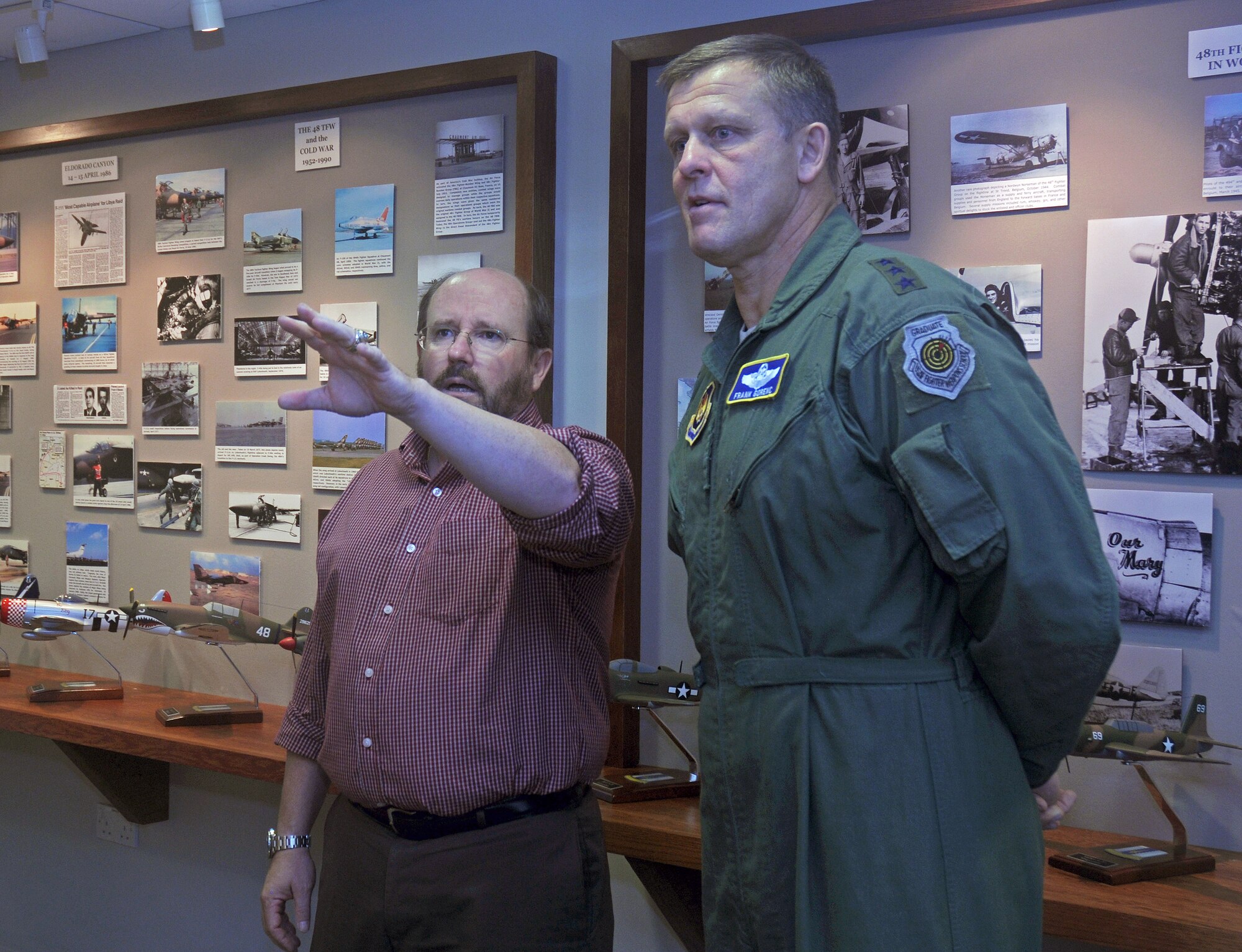Billy Harris, 48th Fighter Wing historian discusses several heritage displays at the newly opened 48th Operations Group Heritage Center with Lt. Gen. Frank Gorenc, 3rd Air Force commander Sept. 8, 2009, at RAF Lakenheath, England. General Gorenc visited Lakenheath to discuss issues Airmen have in today’s Air Force. (U.S. Air Force photo by Senior Airman Kristopher Levasseur)