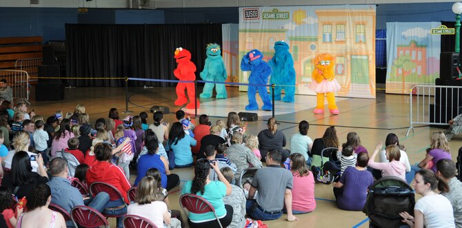 RAF MILDENHALL, England -- About 1,000 people attended Sesame Workshop/United Service Organization free traveling tour shows in the Northside Fitness Center here Sept. 8. The show, titled "Talk, Listen, Connect" is on an eight-week European tour, which will include stops in Germany, Spain, Guam, Belgium and Italy. The show is designed to teach children to cope with the unique challenges military families face. The tour will later make stops in Alaska, Hawaii and Asia. (U.S. Air Force photo/Senior Airman Thomas Trower)