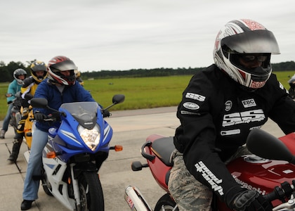Airmen prepare to perform their next move during the Sport Bike Course on Charleston AFB's flightline Sept. 2. The motorcycle course allows riders to become more competent with their bike in an environment significantly safer than public roads. (U.S. Air Force photo/Senior Airman Katie Gieratz)