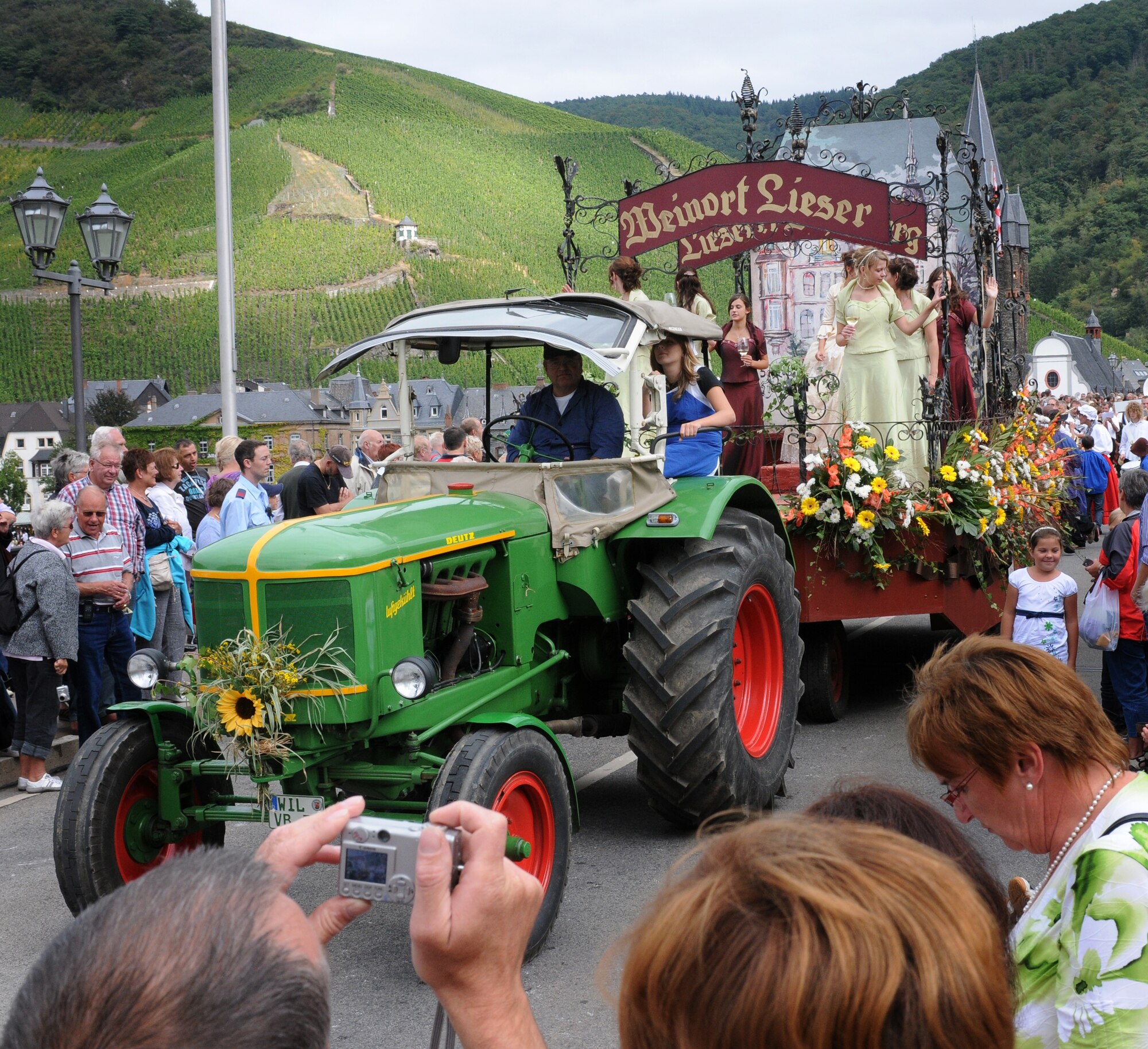 SPANGDAHLEM AIR BASE, Germany -- A crowd of spectators watches a parade during the annual Bernkastel wine festival Sep. 6. The wine festival is held the first weekend in September every year and allows attendees to sample wine from the Mosel region and enjoy festivities including music, fireworks and traditional customs. (U.S. Air Force photo/Airman 1st Class Nathanael Callon)