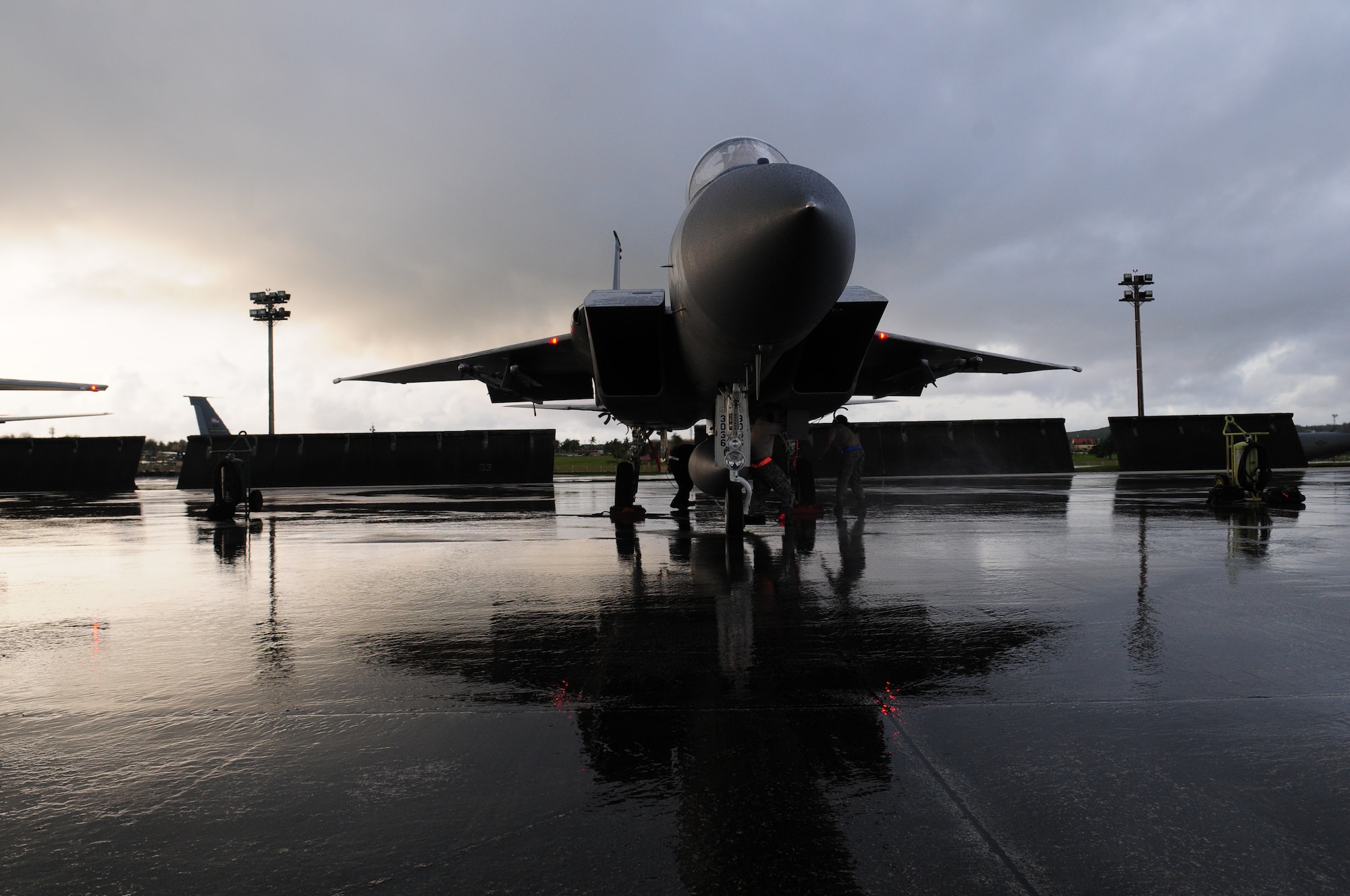 Maintainers from Kadena Air Base, Okinawa, deployed to Andersen Air Force Base, Guam, prepare one of their F-15's for the trip home. The crew spent the last week ensuring six jets were mission-ready. (U.S. Air Force Photo/Tech. Sgt. Mike Tateishi)