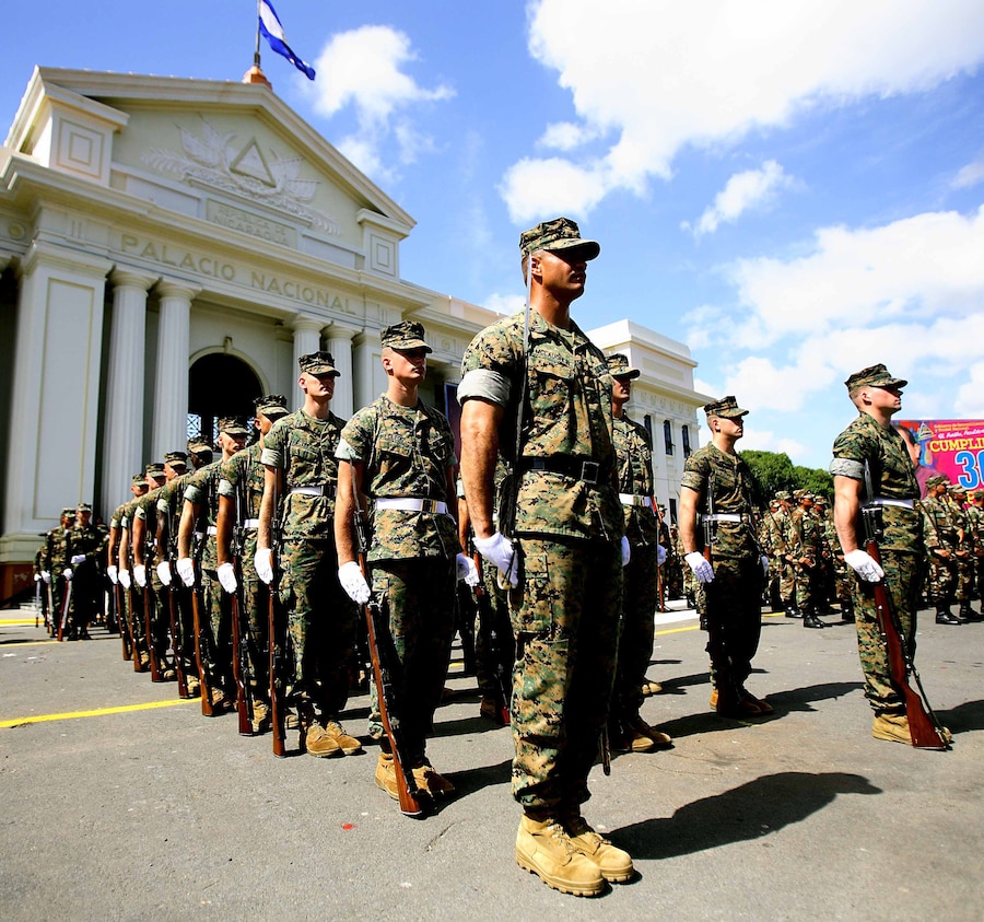 Marines from Company A, Marine Barracks Washington, demonstrate Marine Corps' close order drill during ceremonial practices Sept. 10 in Managua, Republic of Nicaragua. The ceremony marked the 30th anniversary of the Nicaraguan Armed Forces.