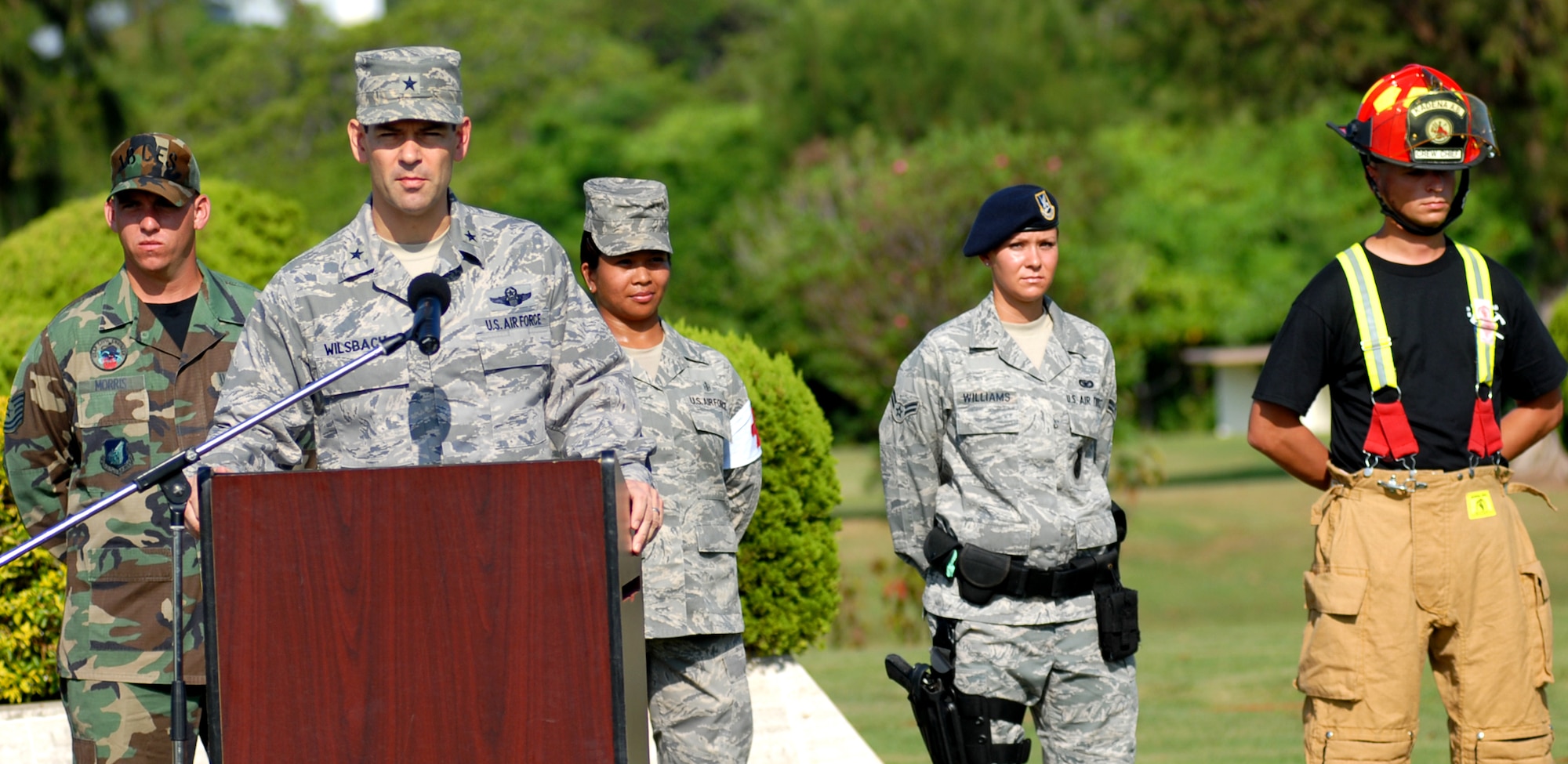 Gen. Ken Wilsbach gives a speech in remembrance of 9/11 memorial ceremony near the wing building here. Kadena Airmen acknowledged those who risked their lives to save the victims of the tragic events of September 11, 2001. The ceremony also paid tribute to the men and women of the U.S. Armed Forces who have served in the military whether deployed or at home station since these events.
(U.S. Air Force photo/Tech. Sgt. Reynaldo Ramon) 


