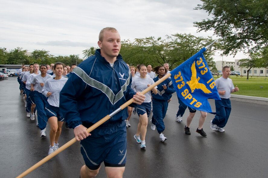 MISAWA AIR BASE, Japan -- Members of the 373rd Intelligence Surveillance and Reconnaissance Group make their way down Risner Circle during a readiness run Sept. 11. Readiness runs are held to promote a healthy Air Force and keep Misawa Air Base personnel fit for deployment. (U.S. Air Force photo/Senior Airman Jamal D. Sutter)