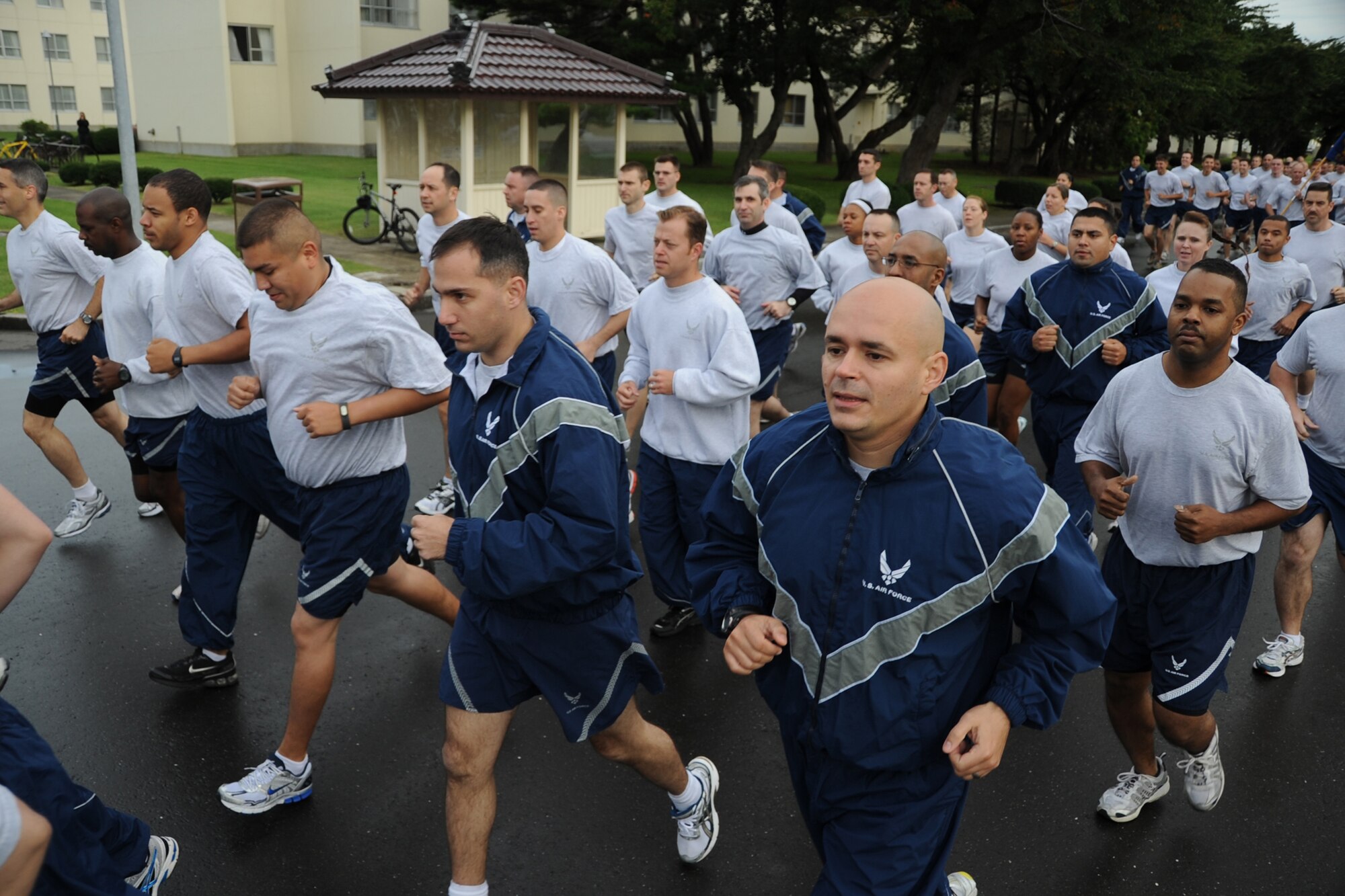 MISAWA AIR BASE, Japan -- Members of the 35th Fighter Wing Staff Agencies make their way down Risner Circle during a readiness run Sept. 11. The run was one of the last to be held before the winter season. (U.S. Air Force photo/Senior Airman Jamal D. Sutter)