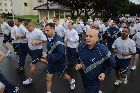 MISAWA AIR BASE, Japan -- Members of the 35th Fighter Wing Staff Agencies make their way down Risner Circle during a readiness run Sept. 11. The run was one of the last to be held before the winter season. (U.S. Air Force photo/Senior Airman Jamal D. Sutter)