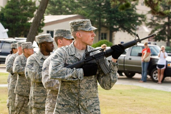 Kunsan's Base Honor Guard fires the 21 gun salute during the September 11 Patriot Day Ceremony Sept. 11 at Kunsan Air Base, Republic of Korea. The ceremony is Kunsan's way of acknowledging the courageous firefighters, police officers, emergency responders and others who risked their lives to save the victims of the tragic events of September 11, 2001. The ceremony also paid tribute to the men and women of the U.S. Armed Forces who have served in the military whether deployed or at home station since these events. (U.S. Air Force photo/Senior Airman Jonathan Steffen) 