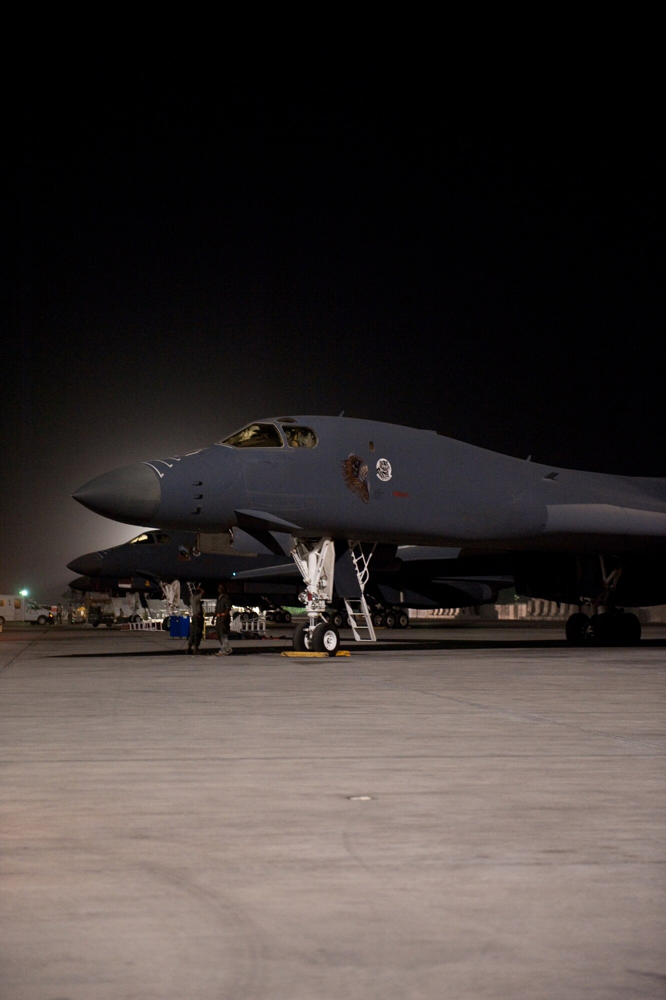 A B-1B Lancer aircrew from the 37th Expeditionary Bomb Squadron prepares to fly a sortie, Sept. 3, in Southwest Asia. The B-1B Lancer is a highly versatile, multi-mission weapon system capable of delivering massive quantities of both precision and non-precision weapons against a variety of targets with a high degree of accuracy. Captain Grasso is deployed from Ellsworth Air Force Base, S.D. in support of Operations Iraqi and Enduring Freedom. (U.S. Air Force photo/Staff Sgt. Robert Barney)