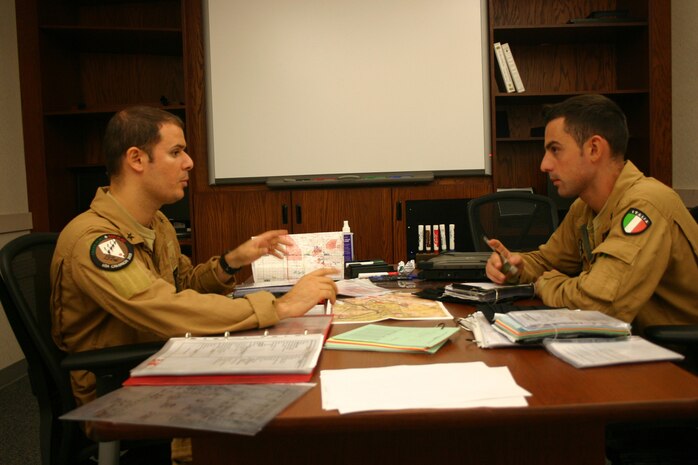 NELLIS AIR FORCE  BASE, Nev. -- Italian air force flight leads prepare their final mission plan in support of the Air Force's Green Flag West, here, and the Army's National Training Center based in Ft. Irwin, Calif. (photo by Casey Bain, JFIIT/USJFCOM)