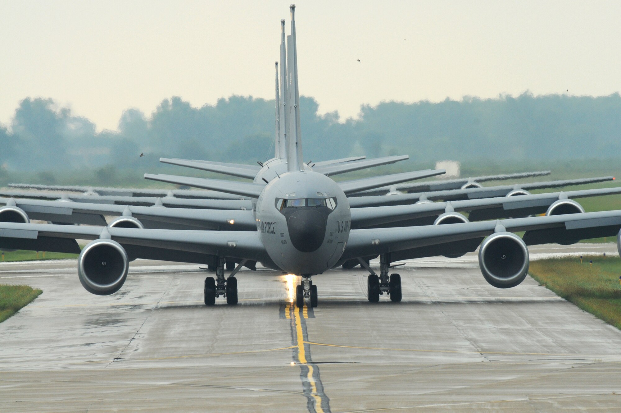 A group of KC-135 Stratotankers from the Iowa Air National Guard's 185th Air Refueling Wing taxi before leaving their home base Sept. 3, 2009, at Sioux City regional airport. The aircraft are departing for a local air refueling mission.  (U.S. Air Force photo/Master Sgt. Vincent De Groot)