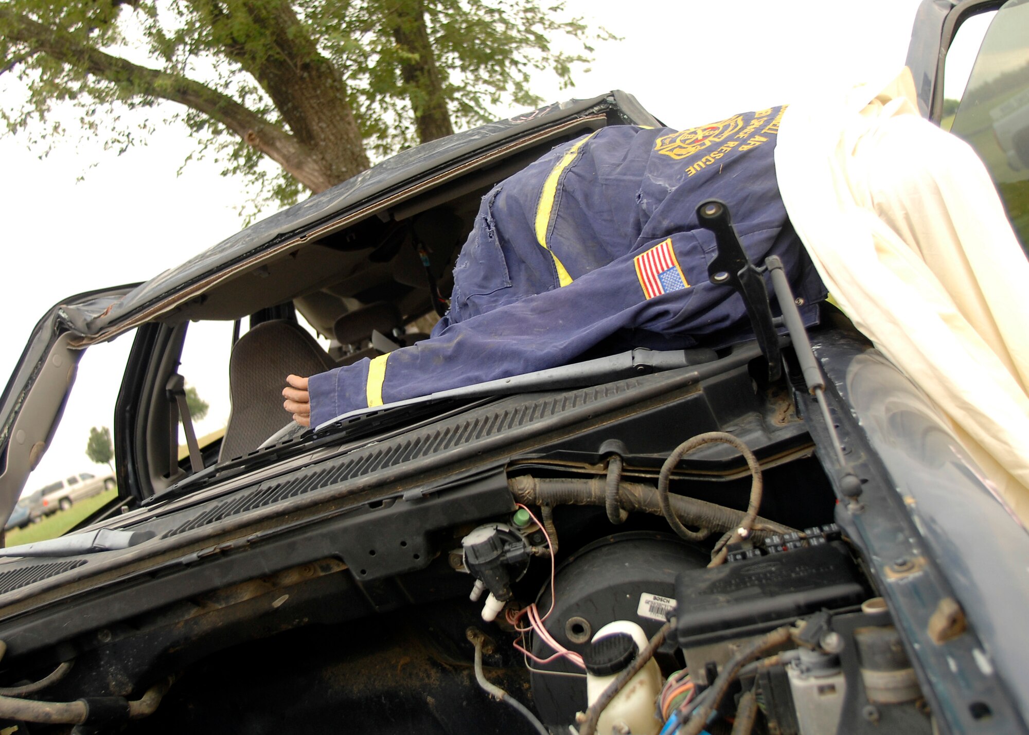A mock vehicle accident is on display at the McConnell Air Force Base, Kan. east gate entrance, Sept. 3 for drivers by to see. The 22nd Air Refueling Wing safety office used the display to remind drivers of the dangers of driving while intoxicated. (U.S. Air Force photo/Senior Airman Anthony Mejia)