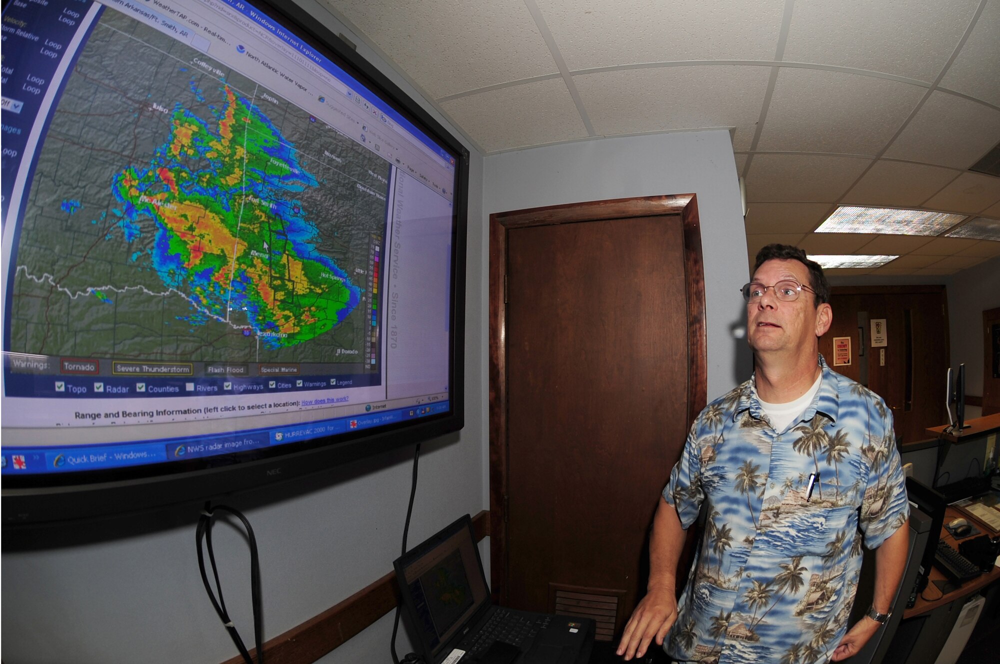 Craig Lewis, 4th Operations Support Squadron meteorological technician, looks at a developing low pressure system over Texas and Louisiana that could cause a high pressure system to settle over Seymour Johnson Air Force Base, N.C., Sept 3, 2009. The high pressure system would bring slightly warmer temperatures and little cloud cover. Mr. Lewis retired from meteorology with the Air Force in 1991 as a Master Sgt. and continues to forecast here as a Department of Defense civilian. (U.S. Air Force photo by Airman 1st Class Rae Perry) 