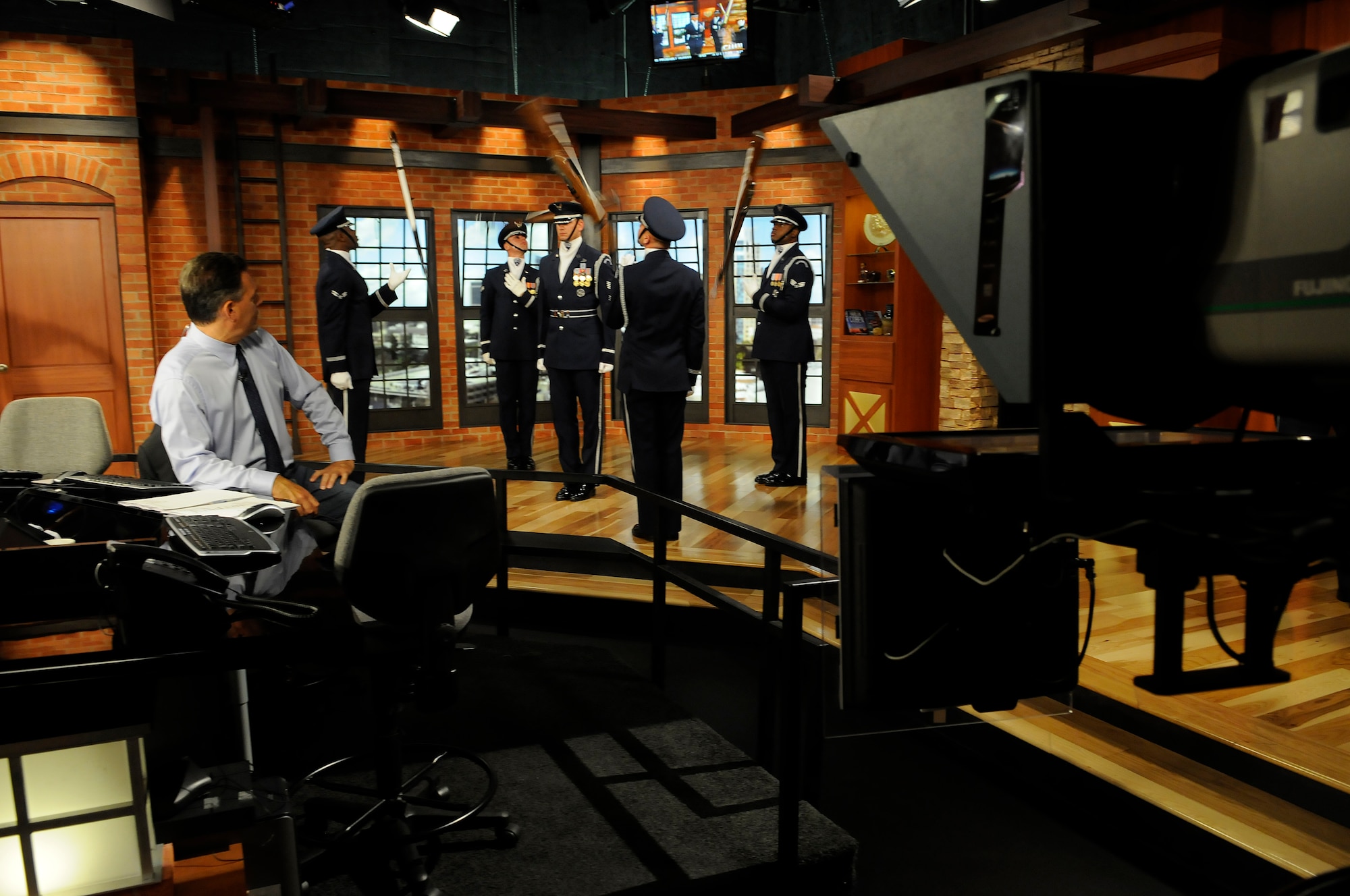 Members of the United States Air Force Honor Guard Drill Team execute their four-man performance on the set of Good Morning Sacramento during a live broadcast Sept. 9 in Sacramento CA. The Team’s performance was as part of Air Force Week Sacramento, which is designed to expose the local population to the power and capabilities of the Air Force and strengthen support for Airmen serving worldwide. (U.S. Air Force photo by Staff Sgt. Dan DeCook)