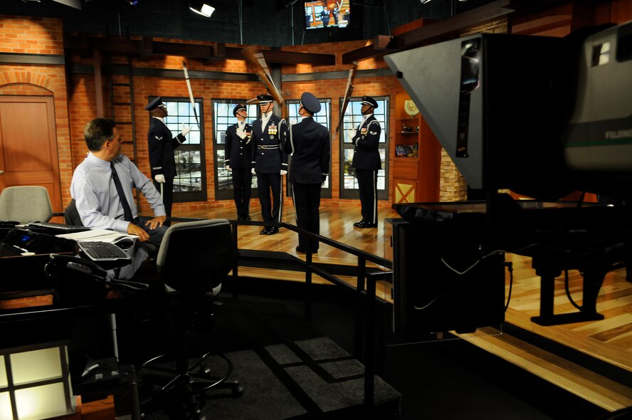 Members of the United States Air Force Honor Guard Drill Team execute their four-man performance on the set of Good Morning Sacramento during a live broadcast Sept. 9 in Sacramento CA. The Team’s performance was as part of Air Force Week Sacramento, which is designed to expose the local population to the power and capabilities of the Air Force and strengthen support for Airmen serving worldwide. (U.S. Air Force photo by Staff Sgt. Dan DeCook)