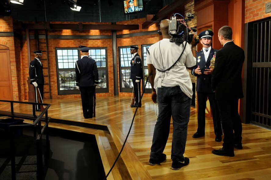 Capt. Michael Fanton, United States Air Force Honor Guard Drill Team commander, is interviewed by news anchor Mark S. Allen on the set of Good Day Sacramento Sept. 9, shortly before members of the Drill Team performed for a live television audience. The Drill Team is currently in Sacramento as part of Air Force Week Sacramento which is designed to expose the local population to the power and capabilities of the Air Force and strengthen support for Airmen serving worldwide. ((U.S. Air Force photo by Staff Sgt. Dan DeCook)