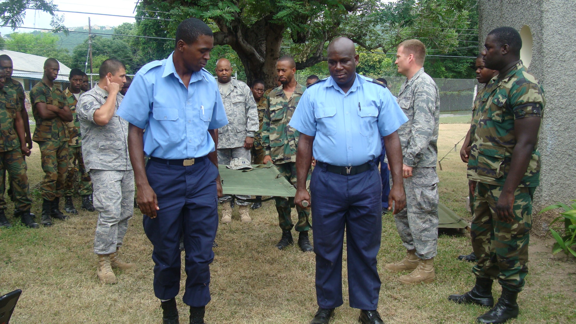 U. S. Air Force instructors with the Defense Institute for Medical Operations based at  Brooks City-Base, Texas, train local first responders on proper litter carry skills in Kingston, Jamaica. (Air Force photo)
