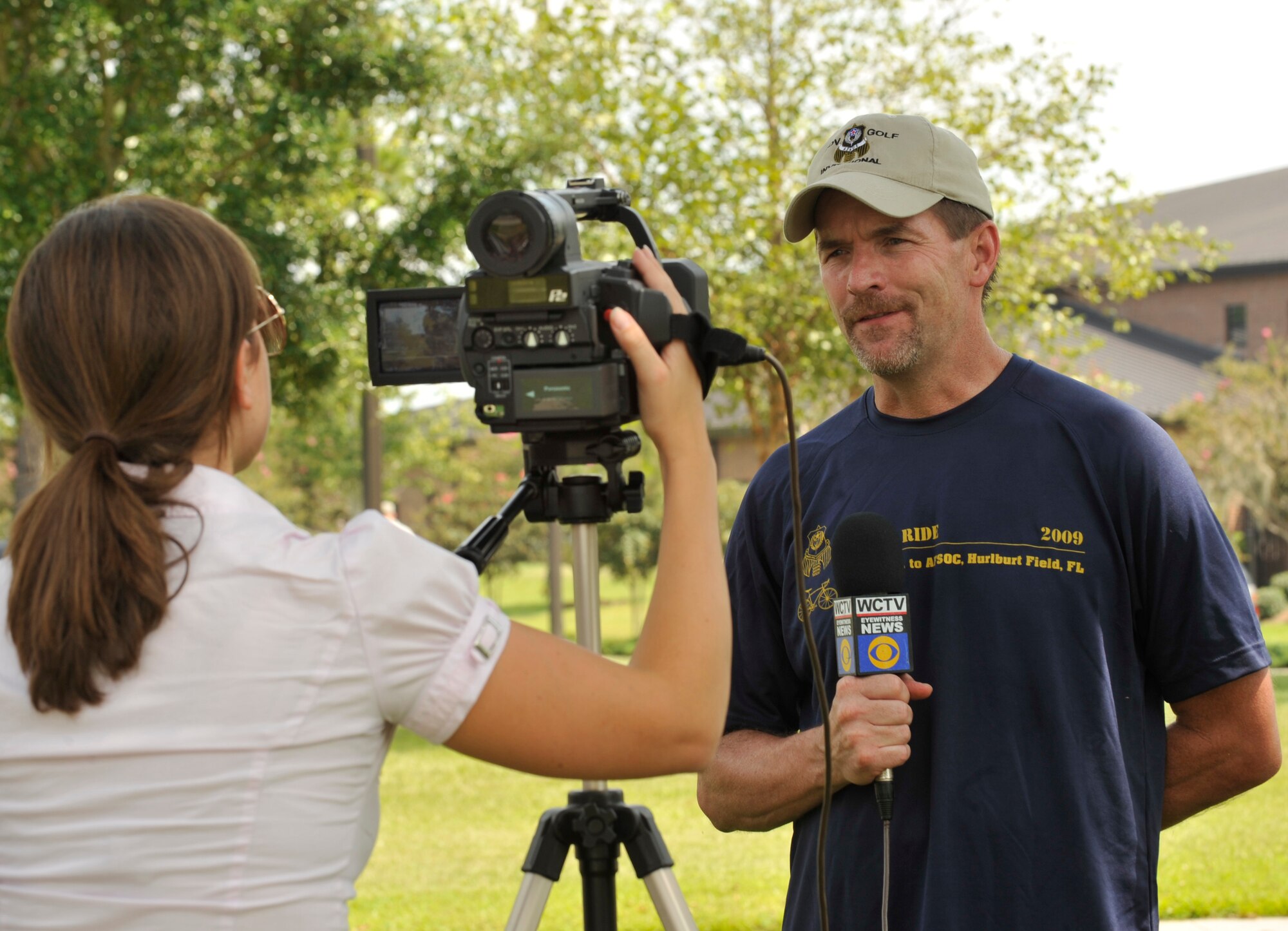 MOODY AIR FORCE BASE, Ga. -- Lt. Bill Stevens, City of Duluth Police Department police officer, is interviewed by a local media representative during the Operation One Voice Honor Ride memorial ceremony here Sept. 9. Lieutenant Stevens is part of the Honor Ride team, which consists of 10 cyclists participating in a three-day, 500-mile bicycle ride in honor of fallen special operations members. (U.S. Air Force photo by Senior Airman Schelli Jones)