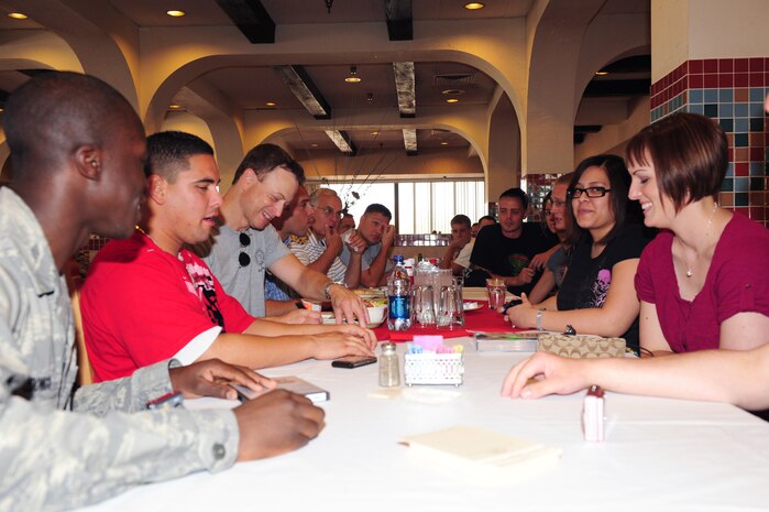 NELLIS AIR FORCE BASE, Nev. -- Mr. Gary Sinise meets with Nellis Airmen at the Crosswinds Dining Facility during a visit, Sept. 7. Mr. Sinise spent the day touring various agencies on base and greeting Airmen. (U.S. Air Force photo by Staff Sgt. William Coleman)