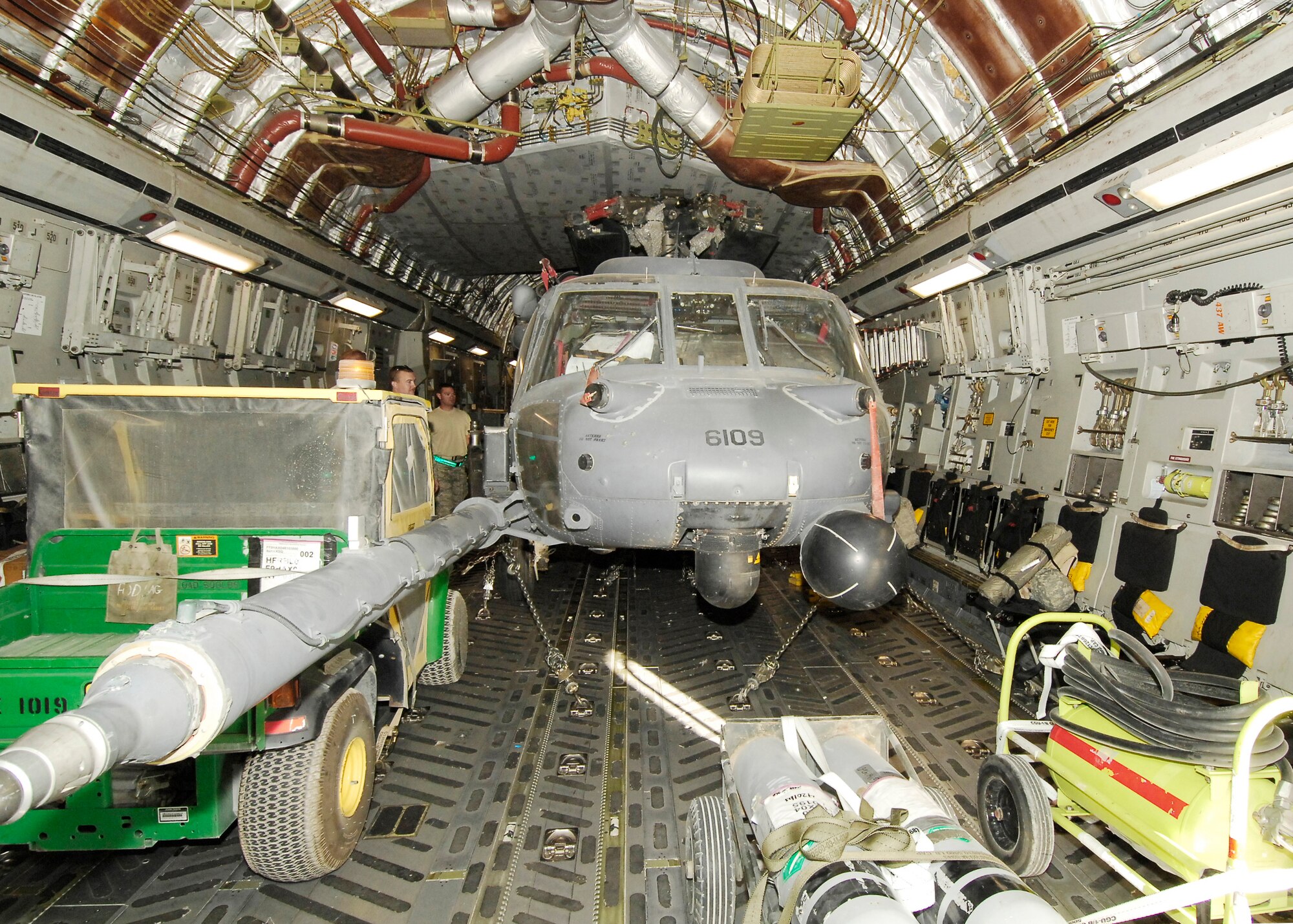 An HH-60G Pave Hawk, secure on the C-17 Globemaster III, waits to take off Sept. 9, 2009, at Bagram Airfield, Afghanistan. The C-17 is transporting the  helicopter back to home station for redeployment. (U.S. Air Force photo/Senior Airman Felicia Juenke)