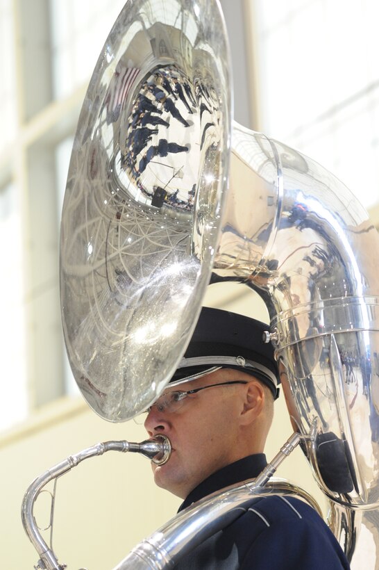 LANGLEY AIR FORCE BASE, Va. – Staff Sgt. Chris Moore, United States Air Force Heritage of America Band tubist, plays during the Air Combat Command change of command ceremony here Sept. 10.  Gen. John D.W. Corley relinquished command to Gen. William M. Fraser III during today's ceremony.  (U.S. Air Force photo/Staff Sgt. Barry Loo)