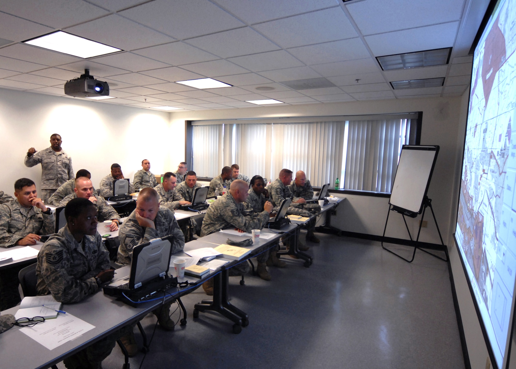 Security forces Airmen train on the Army's Blue Force Tracker system during their pre-deployment training at the Air Force Expeditionary Center's 421st Combat Training Squadron Aug. 29, 2009, at Joint Base McGuire-Dix-Lakehurst, N.J. The Blue Force Tracker is a system that gives air and ground units and their commanders a real-time picture of the battlefield. (U.S. Air Force photo/Tech. Sgt. Paul R. Evans) 
