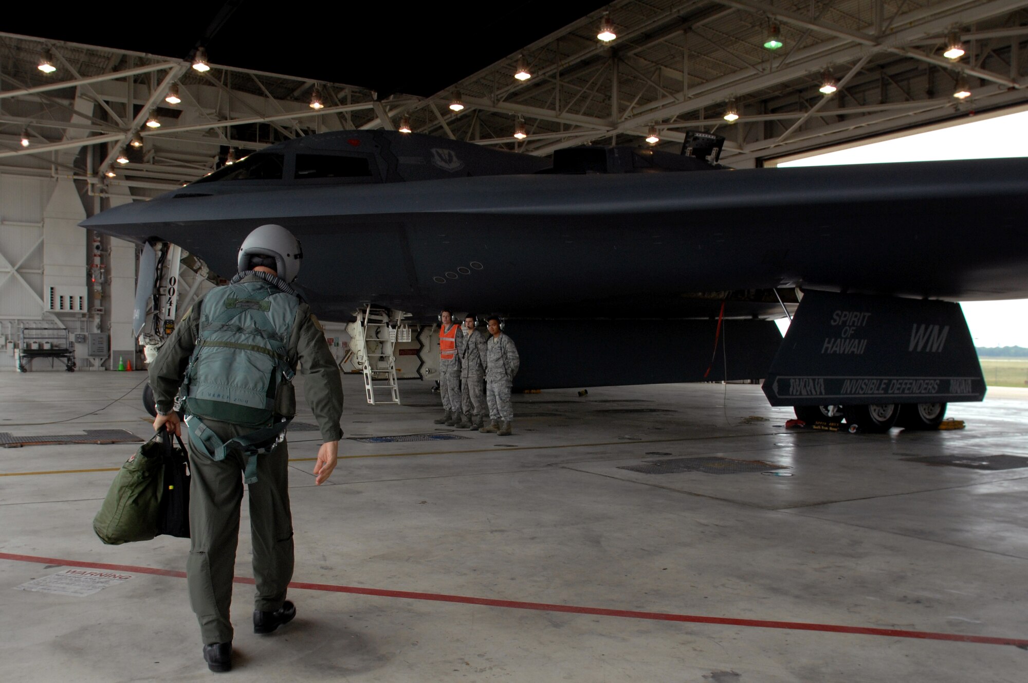 WHITEMAN AIR FORCE BASE, Mo. - Brig. Gen. Joseph Brown, deputy director for Nuclear Operations, U.S. Strategic Command, prepare for his first flight aboard the B-2 Spirit, Sept. 8. General Brown visited to Whiteman for three days to fly the B-2 Spirit and discuss nuclear operations and procedures with enlisted and officer personnel. (U.S. Air Force photo/Senior Airman Kenny Holston)