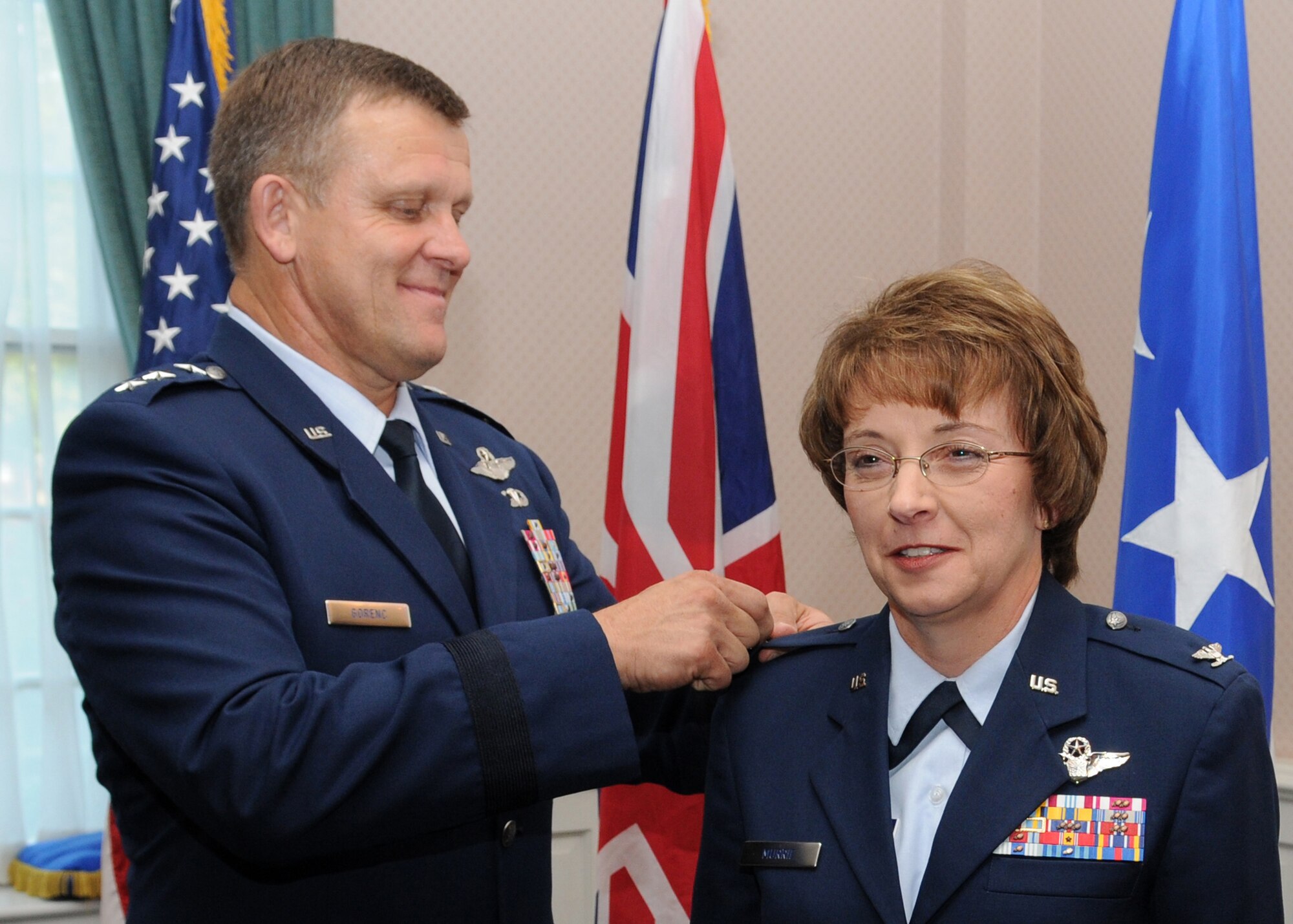 RAF MILDENHALL, England – Lt. Gen. Frank Gorenc, Third Air Force Commander, pins a star on the Air Forces newest Brigadier General, Eden J. Murrie, former 100th Air Refueling Wing commander, during her promotion ceremony at Middleton Hall Sept. 8, 2009. General Murrie will be the next special assistant to the vice chief of staff at Headquarters U.S. Air Force, Washington D.C. (U.S. Air Force photo/ Staff Sgt. Jerry Fleshman)