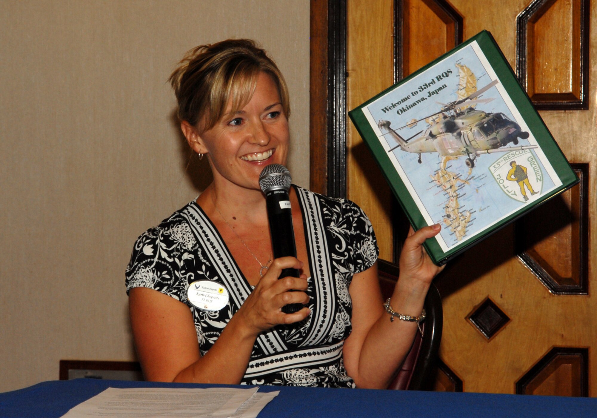 Karin Choquette, wife of 33rd Rescue Squadron Commander Lt. Col. Sean Choquette, tells about projects she's taken on in her husbands squadron. One of the many benefits to the Spouse Forum was the opporutnity for spouses to share ideas on how to better support the families of Kadena servicemembers. (U.S. Air Force photo / Junko Kinjo)