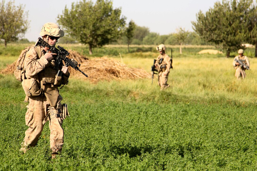 U.S. Marine Corps 1st Lt. Rodney Malone leads a group of Marines ...