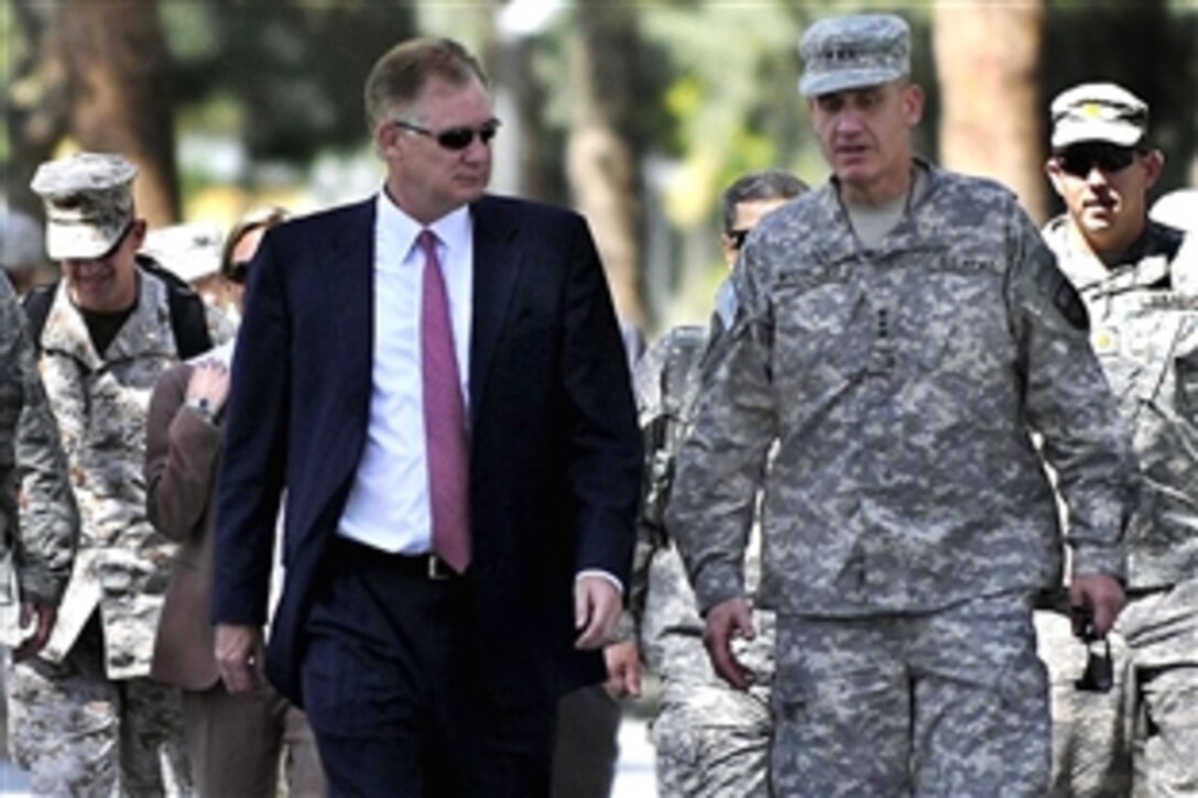 U.S. Deputy Defense Secretary William J. Lynn III walks with Army Lt. Gen. David Rodriguez, deputy commander International Security Assistance Force, at the Afghan Ministry of Defense in Kabul, Sept. 9, 2009. Lynn was on his first trip to Southwest Asia after being confirmed in his position. 