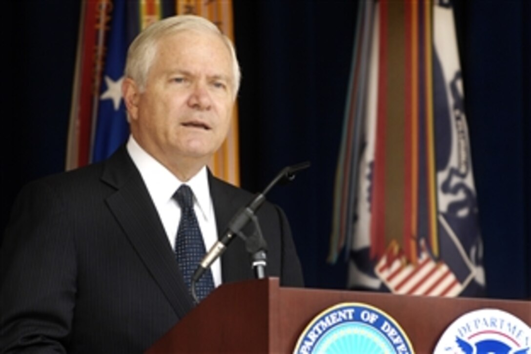 Defense Secretary Robert M. Gates makes remarks during a U.S. naturalization ceremony, where 31 military members took the oath of allegiance in front of family and friends in the Pentagon courtyard, Sept. 10, 2009.  