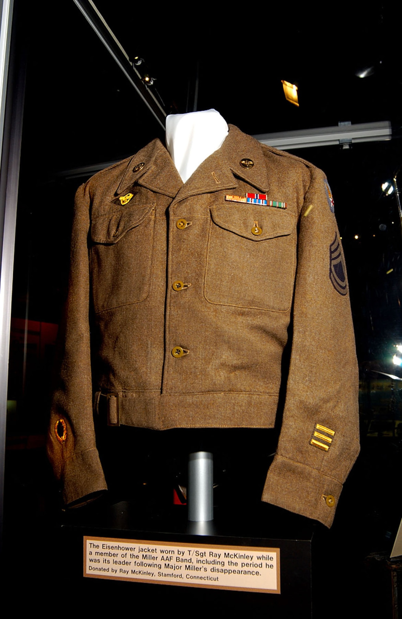DAYTON, Ohio -- Eisenhower jacket worn by Tech. Sgt. Ray McKinley while a member of the Maj. Glenn Miller Army Air Force Band, including the period he was its leader following Maj. Miller's disappearance. The jacket, donated by Ray McKinley of Stamford, Conn., is on display in the World War II Gallery at the National Museum of the U.S. Air Force. (U.S. Air Force photo)