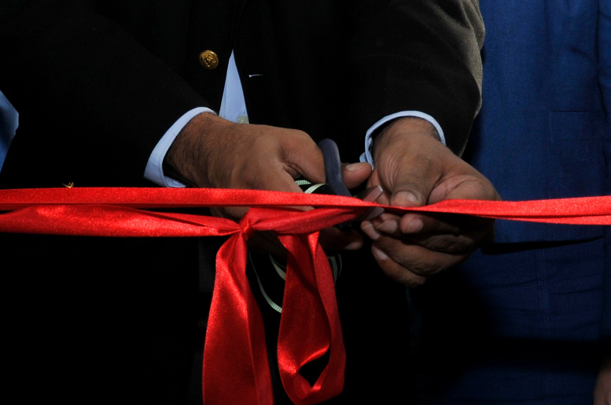 Bharrat Jagdeo, President of Guyana, cuts the ribbon to the new medical clinic Sept. 10, 2009, at the La Pentinence Medical Clinic in Georgetown, Guyana. The $350,000 structure was built by Soldiers of Georgia Army National Guard.  (U.S. Air Force photo by Airman 1st Class Perry Aston) (Released)