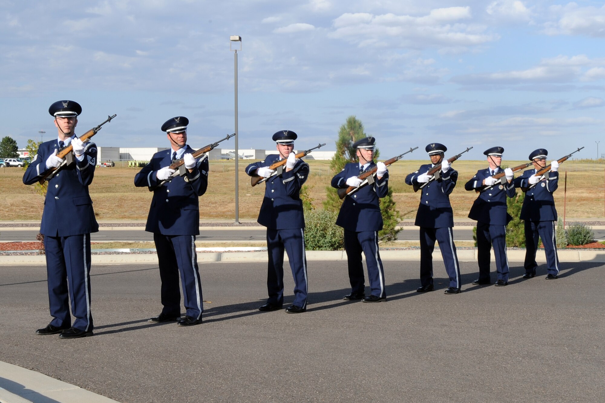 BUCKLEY AIR FORCE BASE, Colo. - Team Buckley honor guard members perform a 21-gun salute during the Patriot Day ceremony Sept. 11. (U.S. Air Force photo by Senior Airman John Easterling)