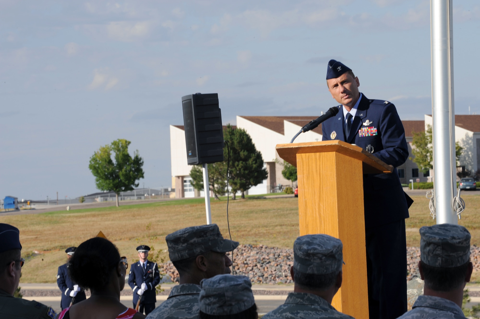 BUCKLEY AIR FORCE BASE, Colo. -- Col. Clint Crosier, 460th Space Wing commander, speaks at Buckley's Patriot Day ceremony Sept. 11. During the ceremony, Team Buckley remembered those who died Sept. 11, 2001, during the attacks on the World Trade Centers in New York, the Pentagon and on United Airlines Flight 93 over Pennsylvania. (U.S. Air Force photo by Senior Airman John Easterling)