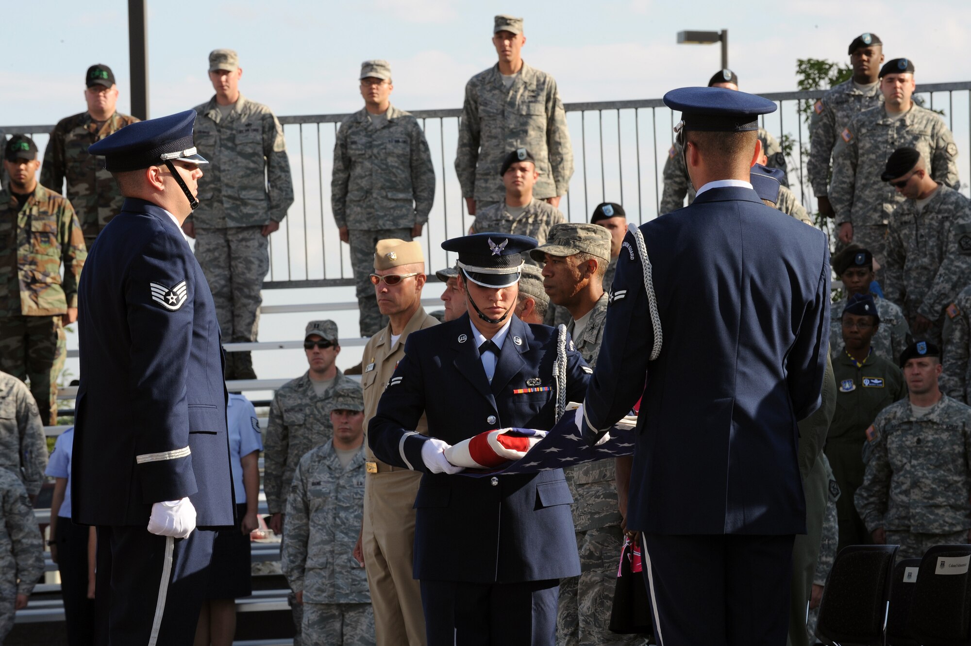 BUCKLEY AIR FORCE BASE, Colo. - The Buckley Air Force Base honor guard perform a flag-folding ceremony during the Patriot Day ceremony Sept. 11. (U.S. Air Force photo by Senior Airman John Easterling)