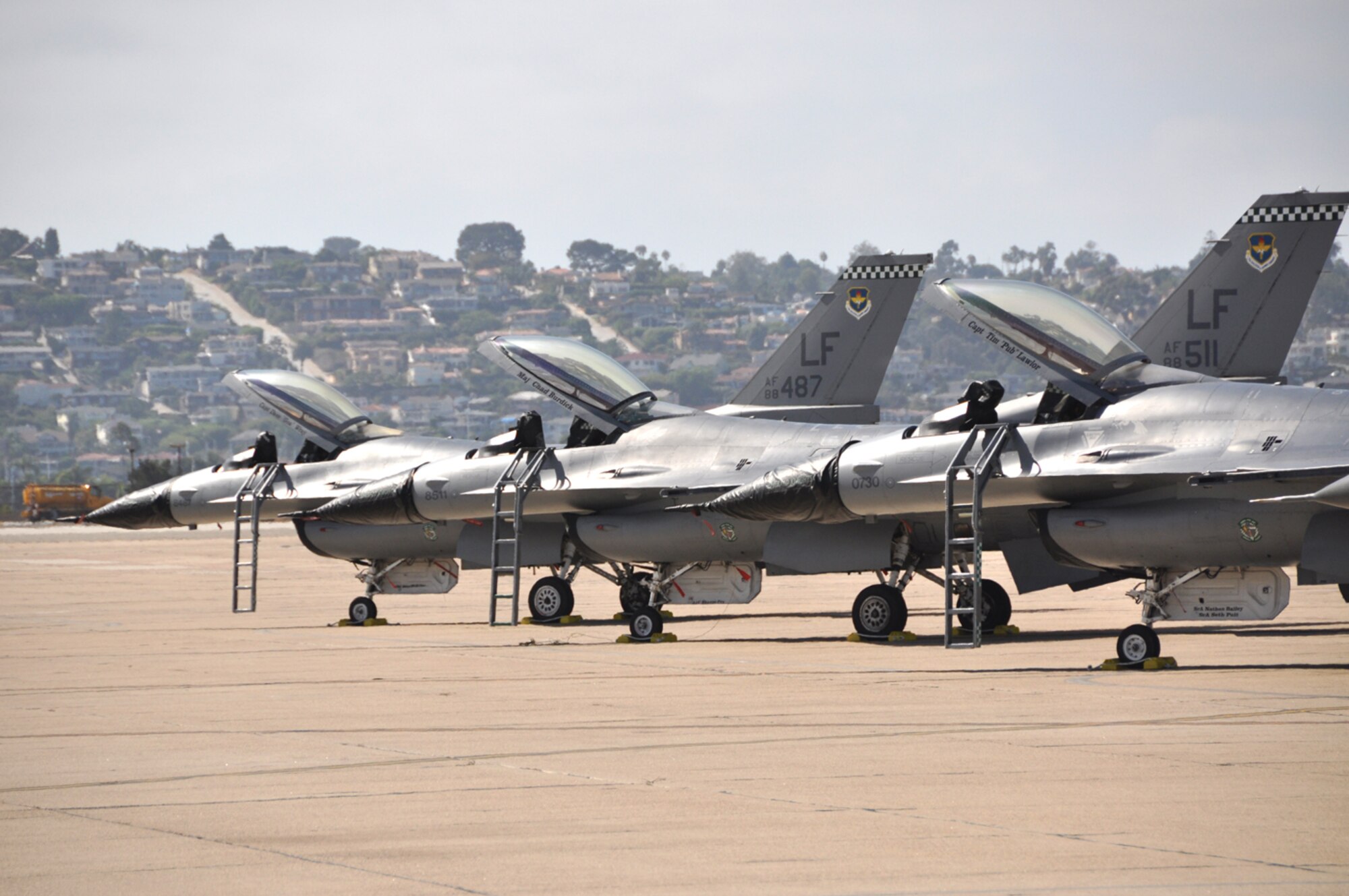 F-16 Fighting Falcons from Luke Air Force Base sit on the runway at Naval Air Station North Island, Calif., Tuesday. Members of the 310th and 308th fighter squadrons trained with the Marine Corps during two different sessions held Aug. 7 through 14, and Aug. 31 through Saturday. (U.S. Air Force photo/ Capt. Travis Clegg)