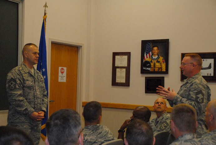 Chief Master Sergeant Kenneth Lier with the 48th Intelligence Squadron asks a question to Chief Master Sergeant of the Air Force James Roy during a brief question and answer session with Beale senior non-commissioned officers Sept. 9, 2009 during a tour of base. (US Air Force Photo/ Tech. Sgt. Luke Johnson)